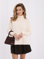 Jasnobeżowy sweter oversize z dłuższym tyłem