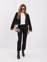 Ecru dopasowany sweter bez rękawów
